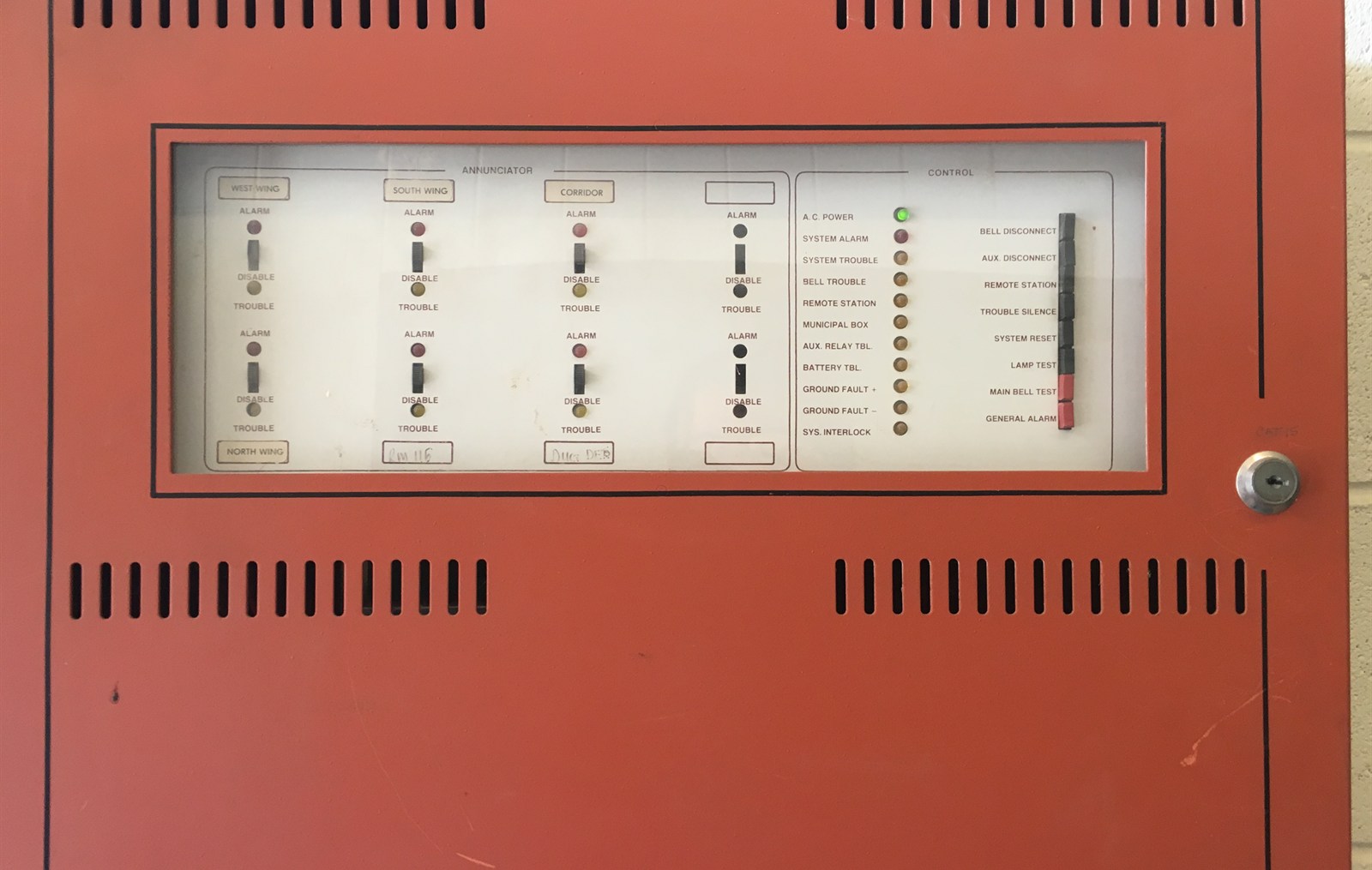 A fire alarm control panel with annunciator and control switches