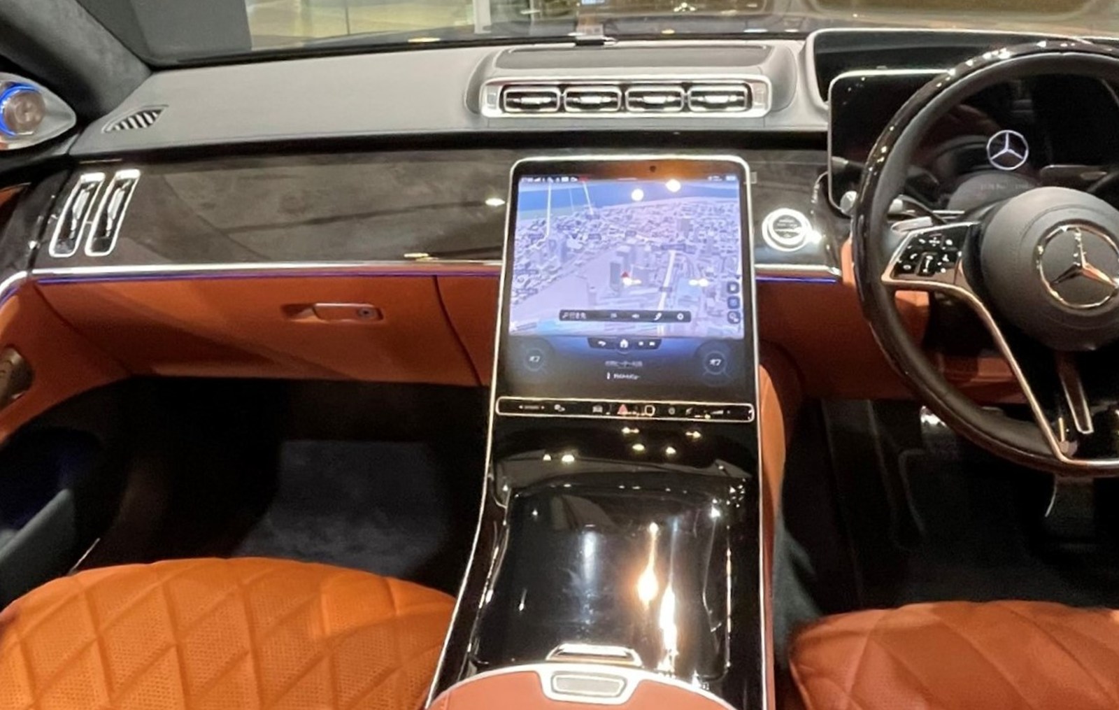 Mercedes-Benz S-Class MBUX portrait touchscreen and dashboard in a cognac leather interior